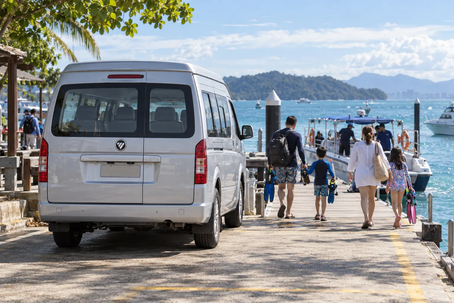 Family walking to a speedboat for Sapi and Manukan island at a Kota Kinabalu jetty beside a Foton van